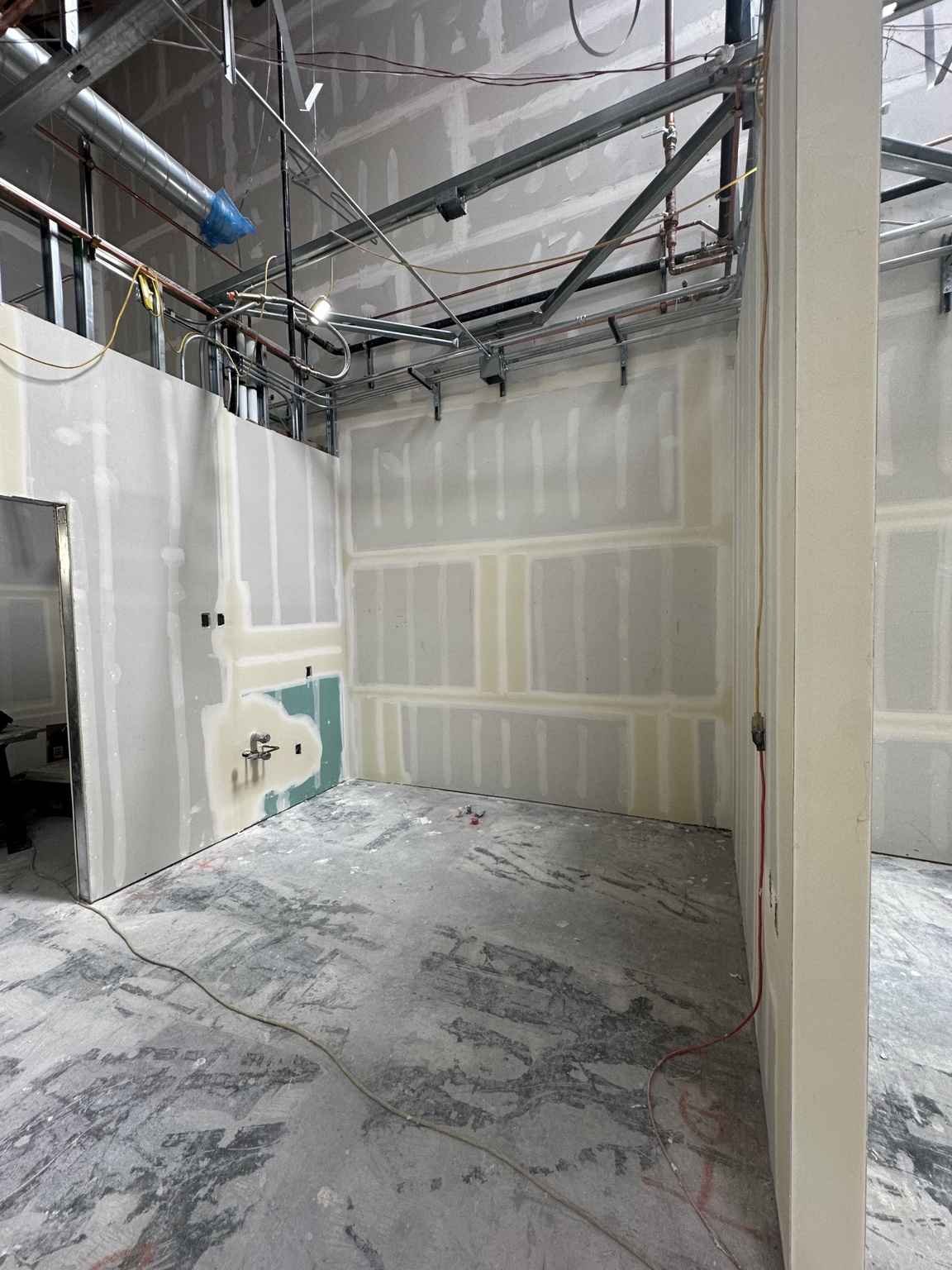 Commercial drywall partitions during installation and joint finishing